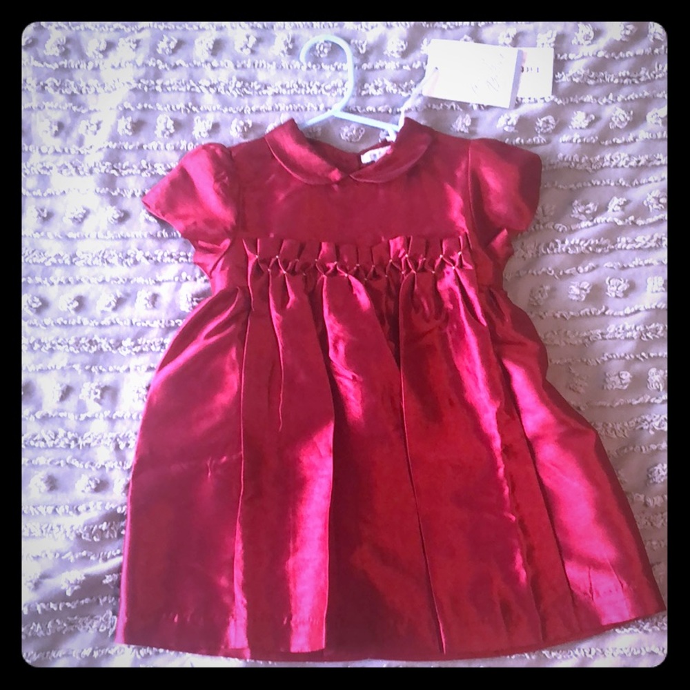 Red dress with bow in back.